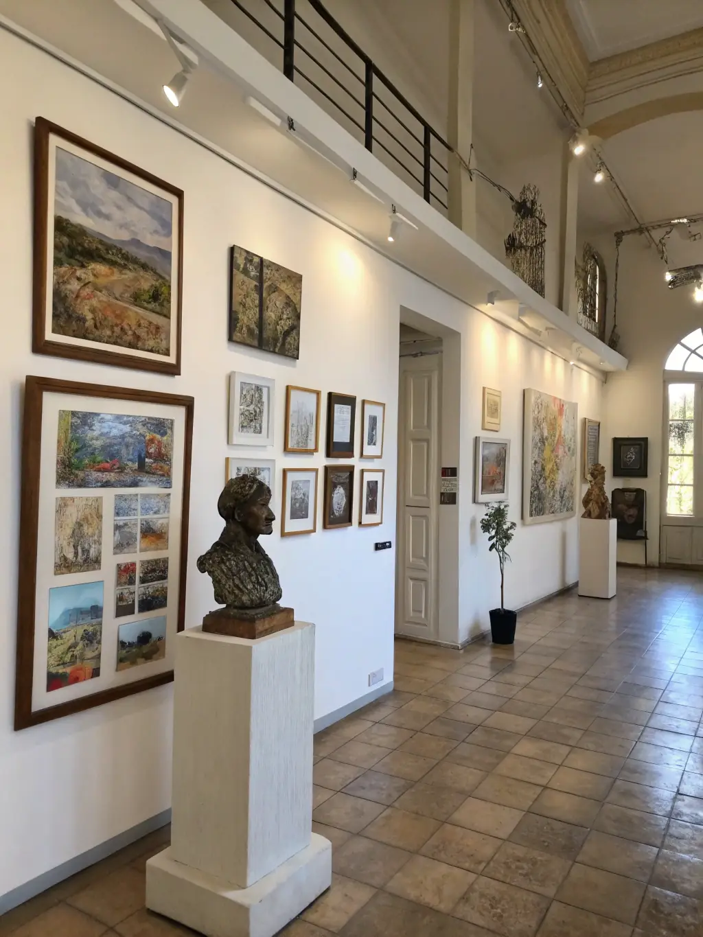 A photo of a contemporary art exhibition featuring innovative and thought-provoking pieces, highlighting the diversity of artistic expression and cultural dialogue.